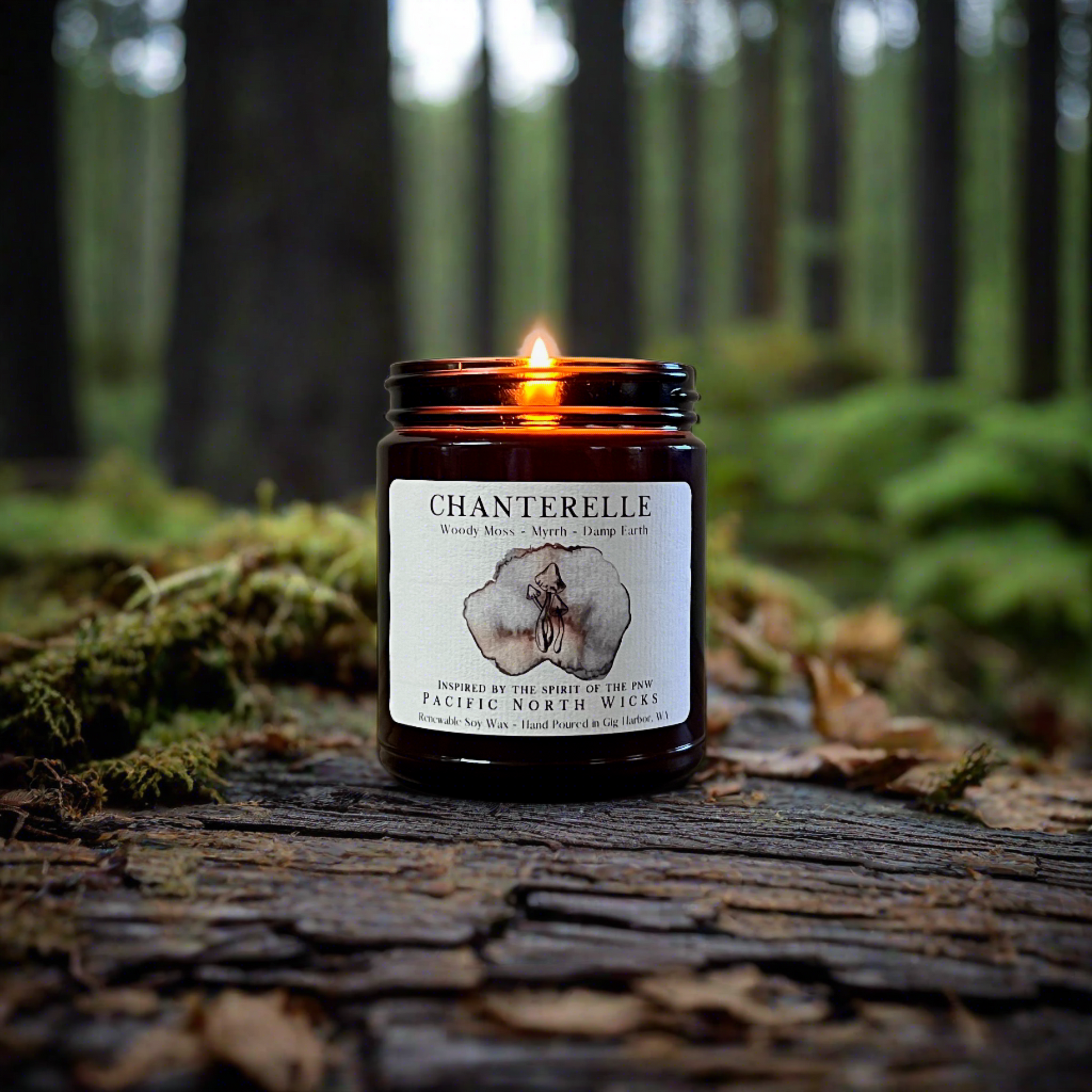 Earthy Scented Candle set in woody, forest setting on dark bark with green moss and evergreen trees surrounding the amber glass jar.