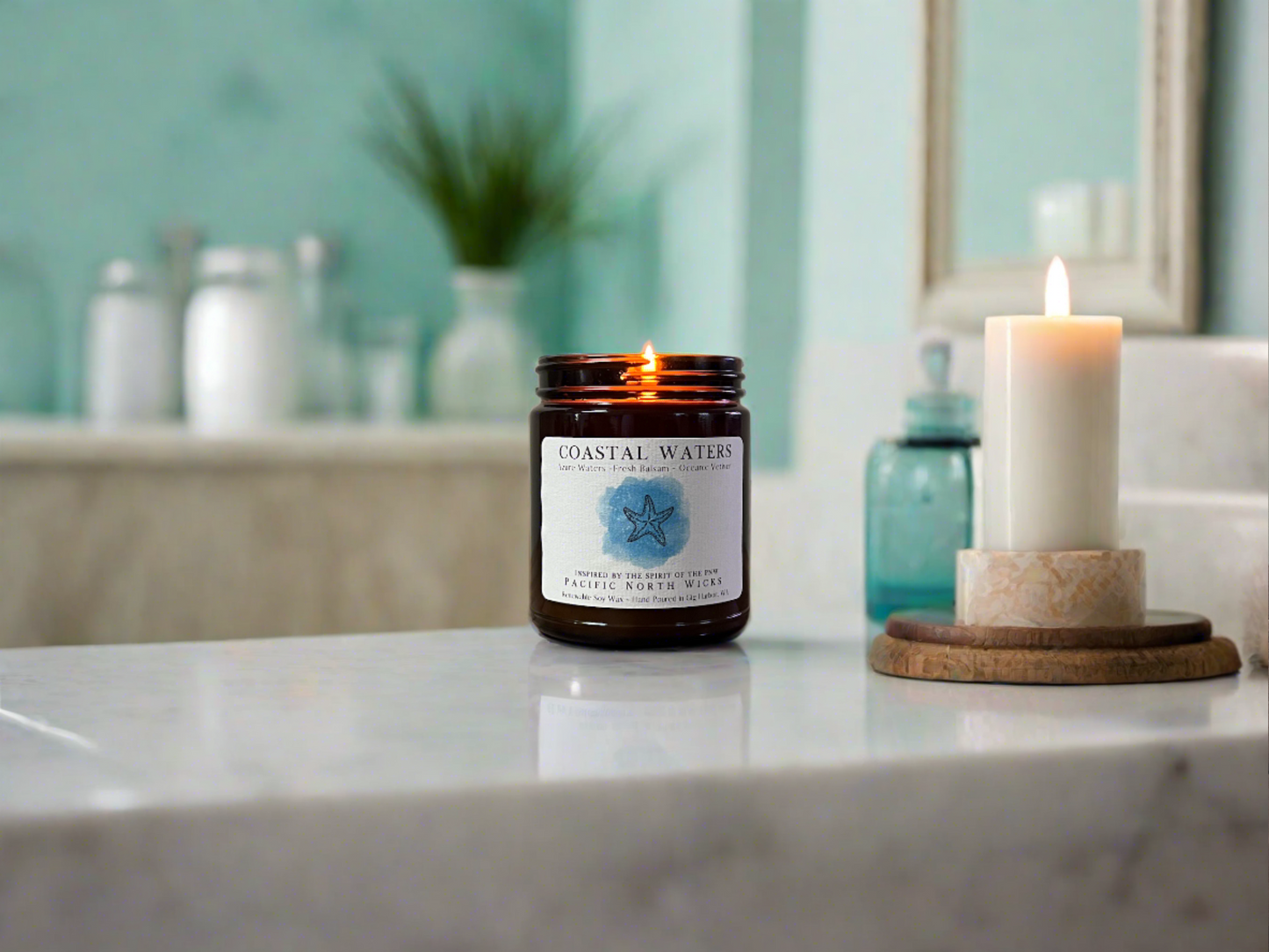 Marine Scented Candle in serene Beach House Bathroom, with marble tub and coastal home decor in hues of the ocean.