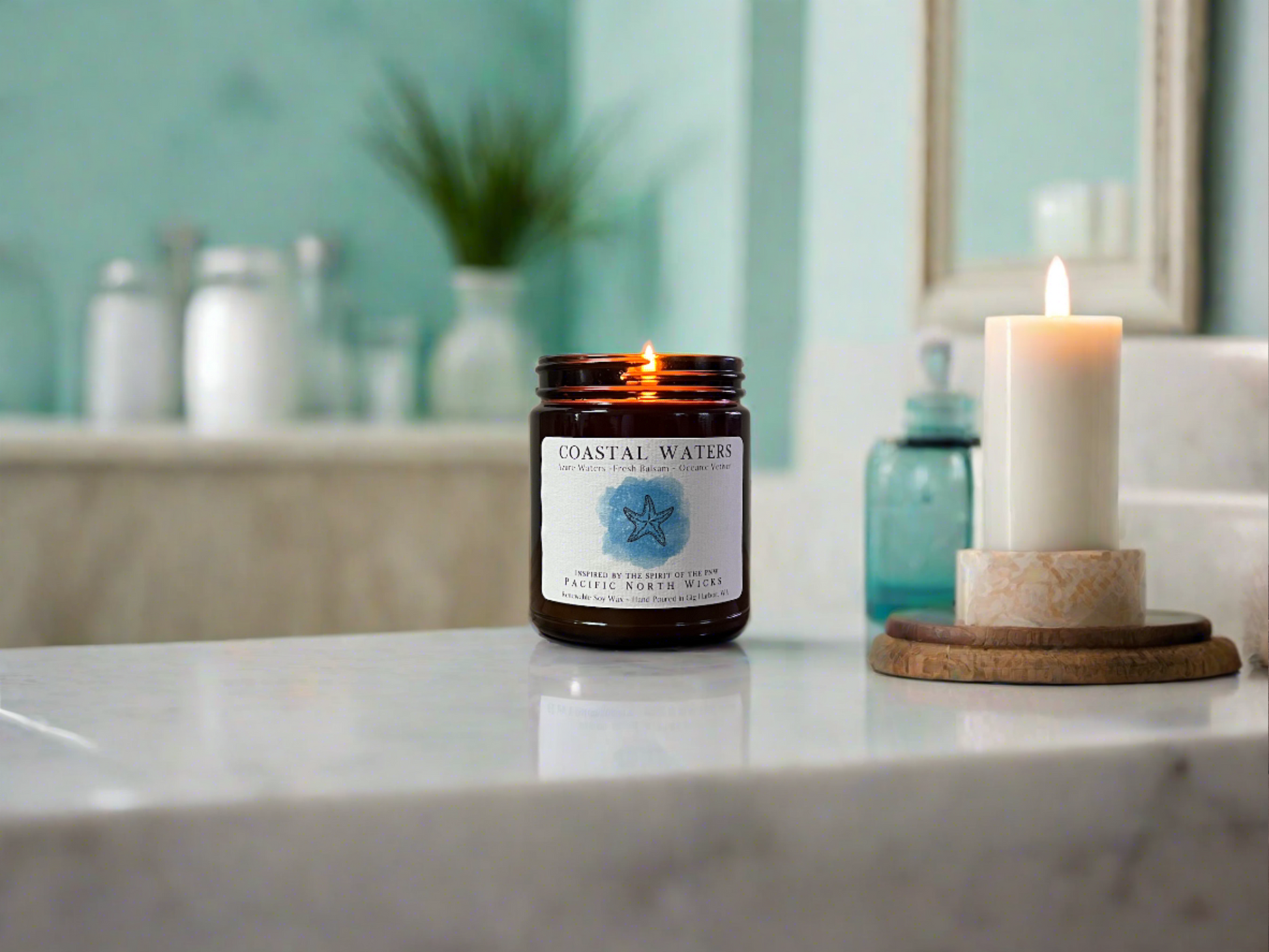 Marine Scented Candle in serene Beach House Bathroom, with marble tub and coastal home decor in hues of the ocean.