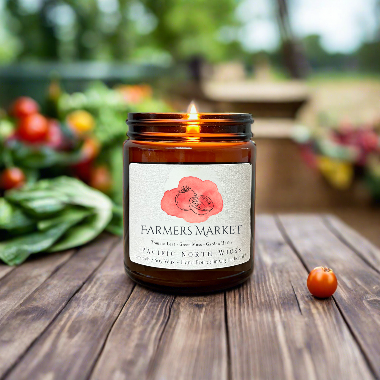Farmers Market candle in outdoor setting with fresh tomatoes and herbs.