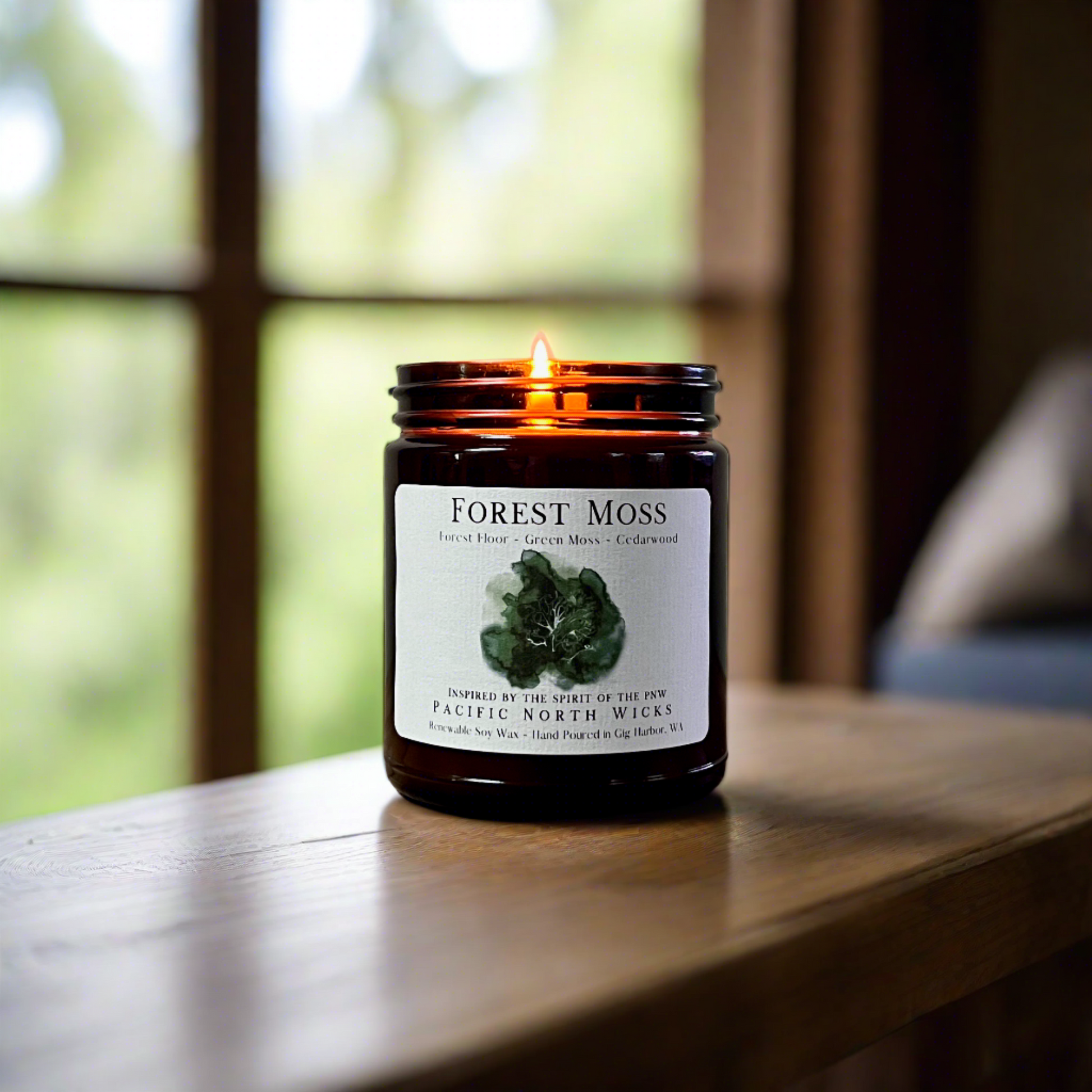Forest Moss candle lit in forest cabin setting.