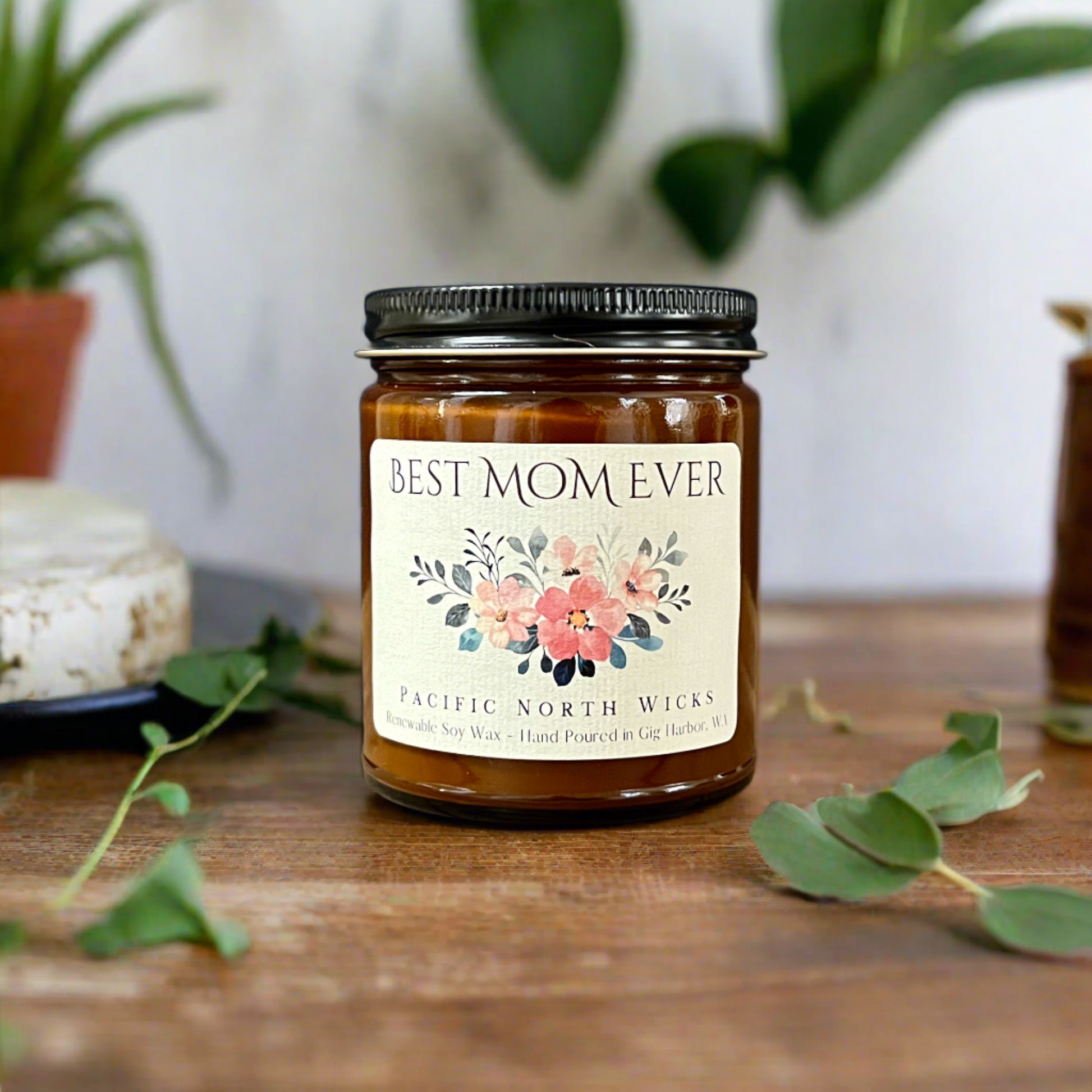 Candle for Mom with Black Lid, Lifestyle shot with green plants